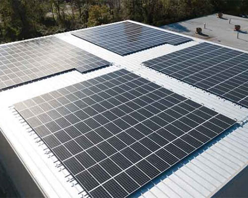 Environmentally-friendly solar panels are installed in Pleasantville warehouse expansion.