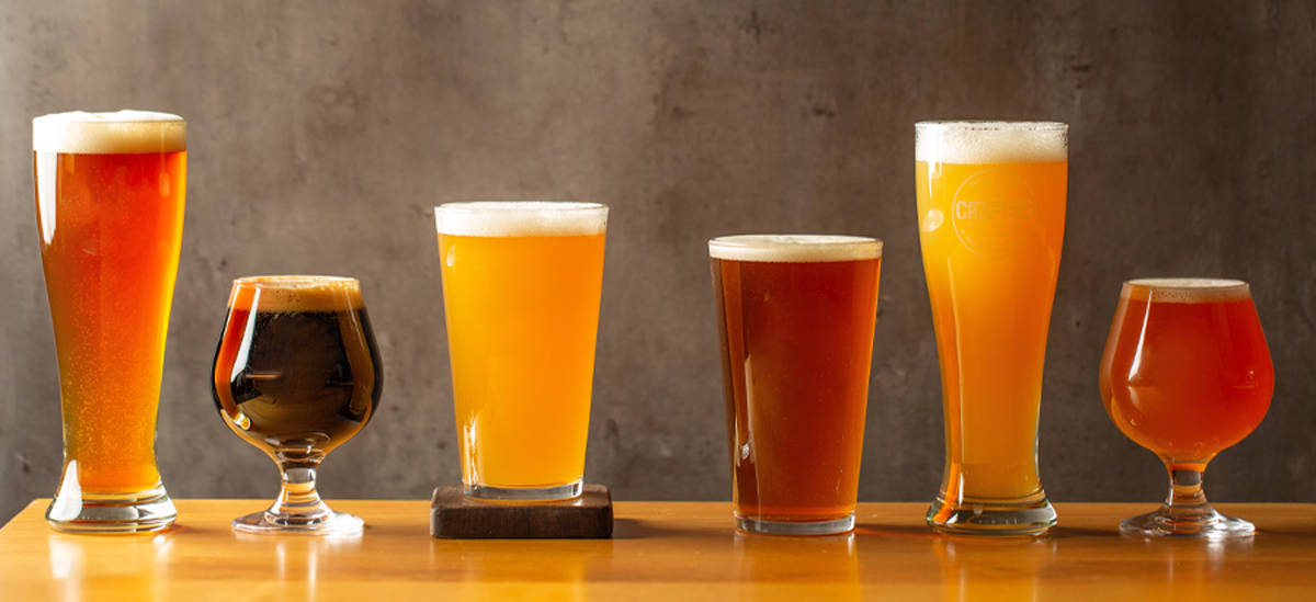 Several different glasses and types of beer