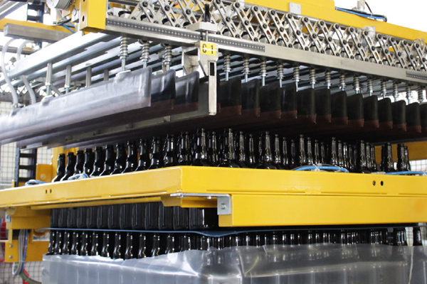 amber glass bottles getting depalletized