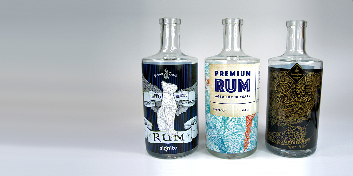 Sample of three rum bottle labels designed and printed using Signite